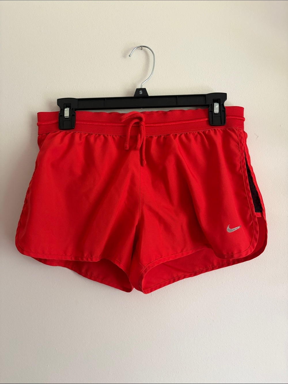 Nike Women's Red Athletic Running Shorts with Silver Swoosh